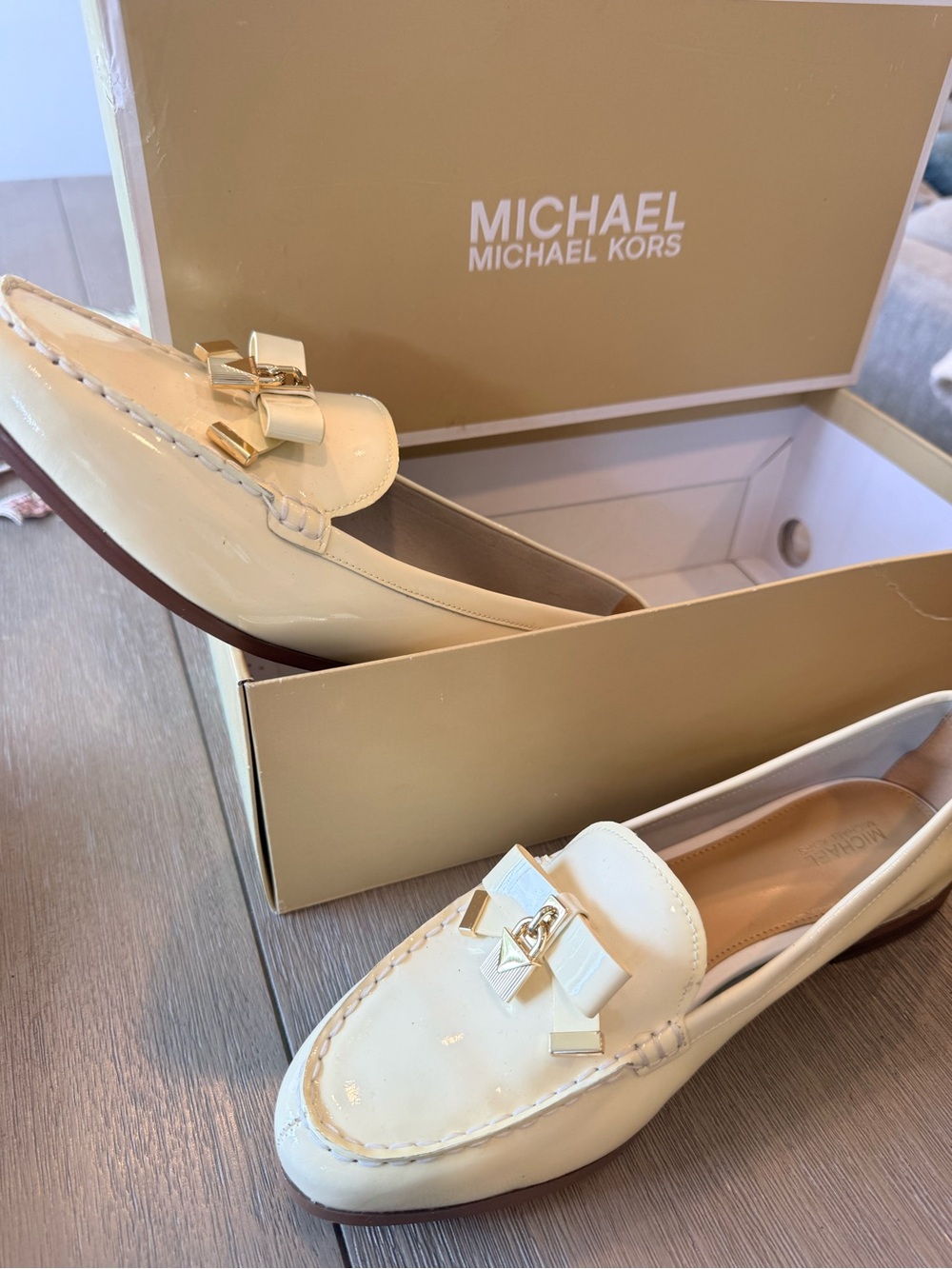 MICHAEL Michael Kors Cream Patent Loafers with Bow & Gold Accent